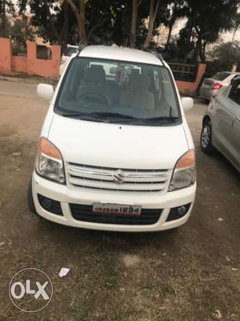  Year Top Model Wagon R Vxi In White Color And Excellent