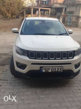 Jeep Compass  only  km. With record