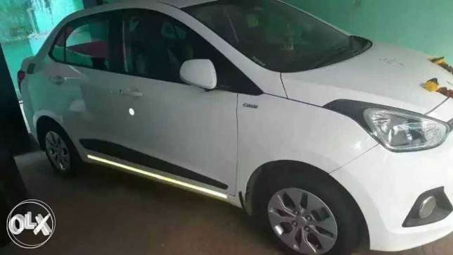  Hyundai Xcent diesel  Kms. Time passers please